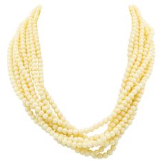 This elegant necklace features 8 strands of 4.66mm (approximately) very pale angel skin coral beads with an elongated 14k yellow gold floral flower filagree clasp. Elegant Dragon, Multi Strand Necklace Gold, Three Strand Necklace, Dragon Skin, Angel Skin, Nugget Necklace, Double Strand Necklace, Cultured Pearl Necklace, Coral And Gold