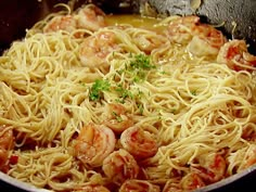 pasta with shrimp and parsley in a skillet