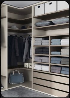 an organized closet with folded towels and other items