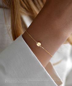 14K Solid Gold Initial Bracelet * Dainty Initial Bracelet * Delicate Bracelet * Personalized Tiny Disk Bracelet * Rose Gold *Gold Fill PRODUCT DESCRIPTION Simple and minimal delicate tiny initial disk bracelet. Customize with your choice of engraved initials or tiny symbols. DETAILS & MATERIALS * Sterling Silver, 14K Gold Filled, 14K Rose Gold Filled & 14K Solid Gold materials. * Tiny 6mm disk. * Add up to 3 disks (2 disks for solid gold). * Available in two chain lengths. * Adjustable by 1"  * Minimal Gold Bracelet, Newborn Bracelet, Tiny Symbols, Personalized Jewelry For Mom, Initial Bracelet Gold, Gold Minimalist Jewelry, Gold Bracelet Simple, Disc Bracelet, Bracelet Rose Gold