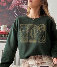 Custom big three astrology sign sweatshirt. A sweartshirt that will uniquely represent you by showing off your sun, moon and rising signs! Beautiful and subtle designs are great for casual wear. Perfect gift for astrology lovers, for birthdays and for that witchy friend you know and love. Don't know your signs? Use this free tool to discover them: https://bit.ly/3QWPOcM Note: you need to know the time of birth in order to find the rising sign ~ don't worry! WE CAN ALSO JUST DO SUN SIGN OR SUN & MOON SIGN PRINTS if there is no birth time available  *HOW TO ORDER*: 1. Choose your size and color (the design is in gold ink and white ink for indigo!) 2. Add Personalization (your sun, moon & rising) 3. Let us know if you'd like the graphic printed on the front or the back. 4. We will get straigh Big Three Astrology, Goblincore Sweater, Indie Sweatshirt, Strawberry Shirt, Dark Academia Clothing, Goblin Core, Big Three, Butterfly Top, Trendy Mom