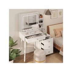 a white desk with drawers and a laptop on it in a bedroom next to a bed