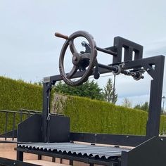 a truck bed with a steering wheel mounted on it's flatbeds and attached to the back