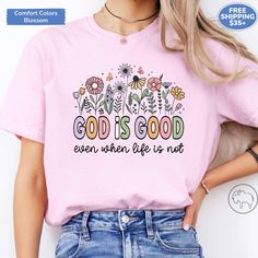 This Comfort Colors "God is Good even when life is not" t-shirt makes the perfect gift for the faithful woman in your life. These beautiful shirts would also be great for the women's Church group.  This Comfort Colors graphic tee is great for layering, so be sure to check out the sweatshirts I offer as well.   You can find the other Christian shirts I offer in my store here:  https://www.etsy.com/your/shops/me/tools/listings/section:48678830,stats:true The Comfort Colors t-shirt is a well-loved Inspirational Pink Cotton T-shirt, Inspirational Pink Tops With Text Print, Pink Cotton Inspirational T-shirt, Inspirational Pink T-shirt With Text Print, Inspirational Slogan T-shirt For Spring, Women Church, Christian Shirt, Christian Shirts, God Is Good