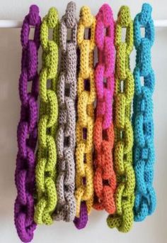 multicolored crocheted chain hanging on the wall