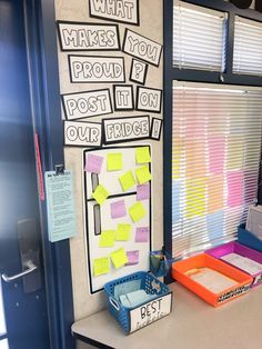 a bulletin board with post it notes on it and some bins in front of it