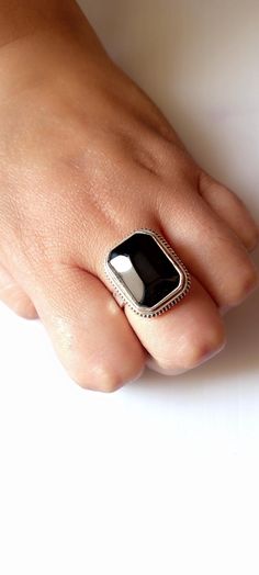 Description Your Most Welcome About This Item. High Quality Black Onyx Ring ~ 925 Sterling Silver Ring ~ Rectangle shape, Handmade Jewelry ~ Statement ~ July Birthstone, Gift For Women Metal = 925 Sterling Silver Stone = Black Onyx Stone Shape = Rectangle Stone Color = Black Brand = Handmade Style = Statement Black Onyx Gemstone Benefits = It is believed to absorb negative energy and provide emotional and physical strength to its wearer. In ancient times, Black Onyx was often worn as a talisman to ward off evil spirits and protect against black magic. Occasion : Birthday Events, Lovely Valentine's Day Gift, Anniversary Gift, Weeding Gift, Engagement Ring, Lover Gift Ring, Hen Party And Other Occasion.... Your order will be handmade and ready for shipment in 1 to 1 business days Normally we Black Rectangular Rings For Gifts, Black Rectangular Ring Gift, Minimalist Rectangular 925 Stamped Jewelry, Minimalist Rectangular Onyx Jewelry, Black Jewelry With Rectangular Stone For Gift, Adjustable Rectangular Sterling Silver Ring, Black Rectangular Stone Jewelry For Gift, Black Rectangular Stone Jewelry Gift, Rectangular Onyx Gemstone Jewelry