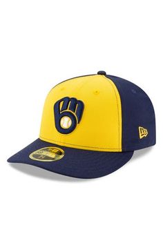 Get ready for the next big Milwaukee Brewers game when you grab this 2020 Authentic Collection On-Field Low Profile Fitted Hat. This New Era cap is great for a major fan like you who never misses a game. The stunning graphics and colors will help you perfect your game day look, especially when paired with your favorite Milwaukee Brewers jersey. Material: 100% Polyester High Crown Structured fit Curved bill Fitted Raised embroidered graphics Six panel construction with eyelets Officially licensed Yellow Curved Brim Baseball Cap For Sports, Yellow Sports Hat With Curved Brim, Yellow Cap For Sports Events, Yellow Flat Bill Hat For Sports Events, Adjustable Yellow Sports Hat, Yellow Curved Brim Sports Hat, Yellow Casual Baseball Cap For Sports Events, Yellow Snapback Hat For Sports Events, Casual Yellow Baseball Cap For Sports Events