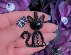 "NOTE ON PROCESSING/SHIPPING TIME: This listing is for one (1) made-to-order black obsidian Halloween black cat pendant. Due to the unique nature of handmade jewelry, your pendant will be in the same design shown, but will not be exact to the example photo. Since this item is made-to-order, I will need 1-2 weeks of processing time to create your pendant before shipping it off.  For domestic orders in the United States, I use a 3-7 day First Class delivery mail service. You can expect to receive Spooky Black Jewelry Gift, Halloween Black Cat Design Jewelry, Spooky Black Necklace For Gift, Wire Wrapped Moon, Black Star Sapphire, Halloween Kitty, Sapphire Cabochon, Lion Necklace, Wolf Necklace