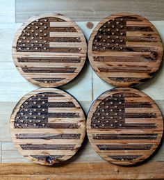 three wooden coasters with the american flag on them