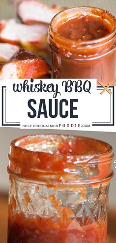 two jars filled with sauce sitting on top of a wooden table