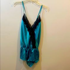 Victoria’s Secret Silk Lingerie Romper Color: Turquoise Size: Medium Condition: Brand New Blue V-neck Camisole For Loungewear, Blue V-neck Party Sleepwear, Victoria's Secret Blue V-neck Sleepwear, Victoria's Secret Blue Sleepwear For Night, Victoria's Secret Blue Sleepwear With Lace Trim, Victoria's Secret Blue Sleeveless Sleepwear, Blue Sleeveless Victoria's Secret Sleepwear, Sleeveless Blue Victoria's Secret Sleepwear, Silk Lingerie