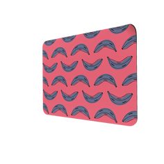 an image of a pink and blue pattern on a computer mouse pad that is designed to look like waves