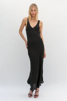 Sometimes loving comes easy, especially in the case of our Love Dress. This dress was made to make you look and feel your best. Featuring a sheer fabric and a bias cut, your body lines and curves will be perfectly accentuated whether worn lounging at home or out and about. Black - 100% Viscose Dry Clean only. Unlined and sheer. Saiai is 5'8 and Darina is 5'11 both wear a size 1 which is equivalent to a Small. This style is for PRE ORDER and will be shipping between July 16th - 17th. Please note Sheer Maxi Slip Dress, Elegant Sheer Slip Dress For Date Night, Sheer V-neck Slip Dress For Evening, Sheer V-neck Maxi Dress For Daywear, Fitted V-neck Maxi Dress For Loungewear, Chic Sheer Back Maxi Dress For Night Out, Chic Maxi Dress With Sheer Back For Night Out, Sheer Slip Dress For Summer Evenings, Chic Summer Slip Dress With Sheer Back