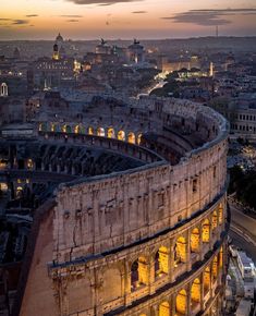 an aerial view of the roman colossion at dusk