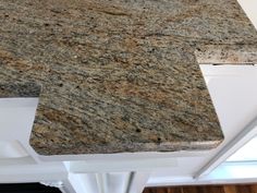 a granite counter top in a kitchen