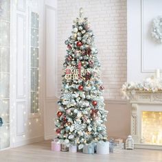 a decorated christmas tree in a living room