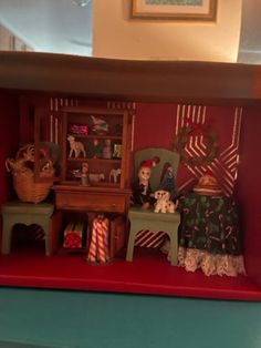 a doll house with furniture and decorations in it