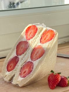 a piece of bread that has strawberries on it