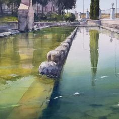 a painting of a pond with rocks in it