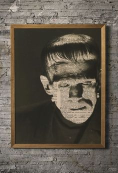 a black and white photo of a man's face is framed on a brick wall