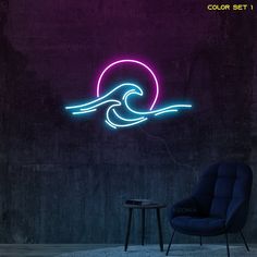 a chair and table in front of a wall with a neon wave on it