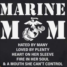 the marine mom t - shirt is black with white lettering and an eagle on it