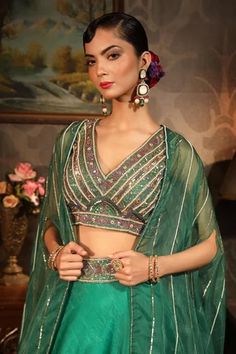 Shop for LAXMISHRIALI Emerald Green Organza Embroidered Ruffled Cape Lehenga Set for Women Online at Aza Fashions Festive Fitted Anarkali Set With Cape Sleeves, Green Organza Dress For Navratri, Navratri Lehenga With Cape Sleeves, Eid Organza Dupatta With Cape Sleeves, Green Floor-length Organza Choli, Festive Pista Green Organza Sets, Green Organza Anarkali Set With Mirror Work, Green Organza Sets With Traditional Drape, Festive Sharara With Cape Sleeves In Organza