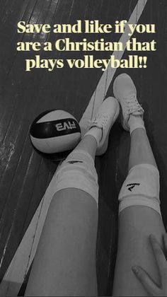 a volleyball player is sitting on the floor with her legs crossed and holding a ball