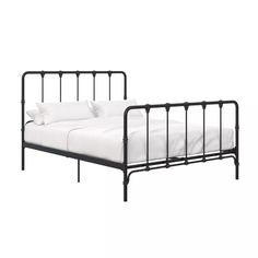 an iron bed frame with white sheets and pillows on it, against a white background