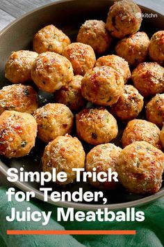 a bowl filled with meatballs on top of a wooden table