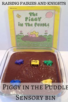 the piggy in the puddle game is shown with its box and instructions on how to play it