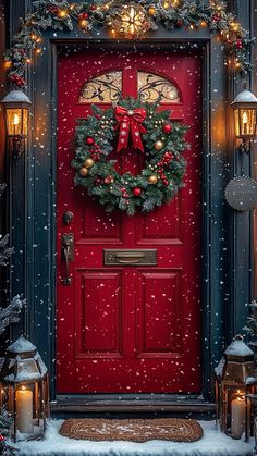 a red door decorated with christmas wreaths and lights