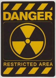 a yellow and black sign that says danger restricted area