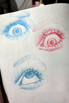 three different colored eyes are shown in this drawing