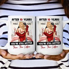 two women holding coffee mugs that say, after 10 years you're still hotter than coffee