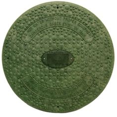 an old green plate that is on display