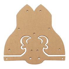 a wooden cutout with two horns on it