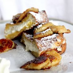 french toast on a plate with powdered sugar