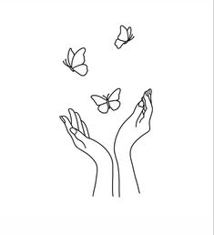 two hands reaching for butterflies in the air