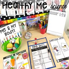 the healthy me science kit is displayed on a table with other items and materials to make it