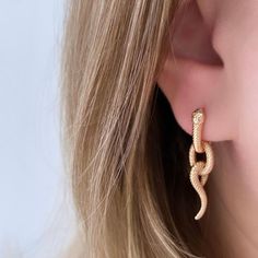 Astonishing 14k gold filled snake mismatched transformer dangle earrings. You can wear them as usual hoops or add snake dangles. Made of higest quality hypoallergenic jewelry alloy. Length: 1.18 and 1.37 inches / 3 cm and 3.5 cm Trendy Gold Snake Shaped Jewelry, Gold Snake-shaped Jewelry With Pierced Ears, Gold Snake-shaped Earrings With Pierced Ears, Gold Snake Jewelry For Pierced Ears, Snake-shaped Yellow Gold Earrings For Gift, Gold Snake Shape Single Earring, Gold Snake-shaped Earrings For Gift, Nickel-free Gold Snake Jewelry, Trendy Snake-shaped Earrings For Gifts