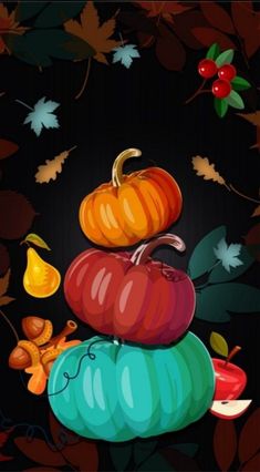 three pumpkins stacked on top of each other in front of leaves and acorns