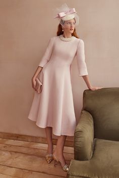 Our beautiful pearl-effect collarettes are hand-beaded onto an ivory silk organza mount. Tied at the back with an ultra feminine baby pink double-sided silk satin ribbon. A glamorous addition to our Lucy Midi Dress in Pink Metallic Tweed, or styled simply onto a round neck cashmere sweater. The ribbons can be made in bespoke silk or velvet colours to complement your dress, please contact us for more information. ---- Beads: 100% Acrylic- Ribbon: 100% Silk --- - One Size Luxury Evening Dresses With Pearl Buttons, Luxury Elegant Dresses With Pearl Buttons, Luxury Pink Lace Work Dress, Satin Ribbon Work On Dress, Ivory Dress Outfit, Suzannah London, Classic Fashion Pieces, Convention Outfits, Royal Outfit