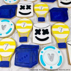 decorated cookies are arranged in the shape of tennis racquets