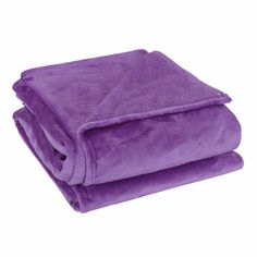 a purple blanket folded on top of each other