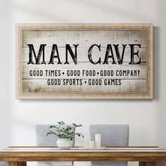 a man cave sign above a dining room table