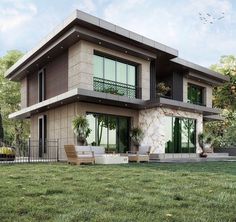 a large house sitting on top of a lush green field