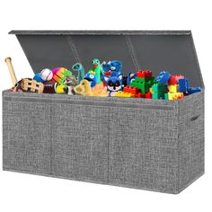 a toy chest filled with lots of toys