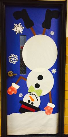 a door decorated to look like a snowman